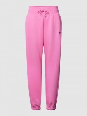 Spodnie sportowe z wysoką talią polarowe oversize Nike różowe