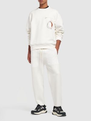 Bavlnené teplákové nohavice Moncler biela