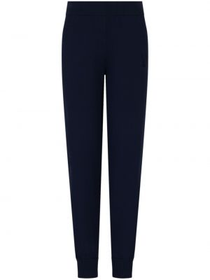 Teplákové nohavice s výšivkou skinny fit Armani Exchange modrá