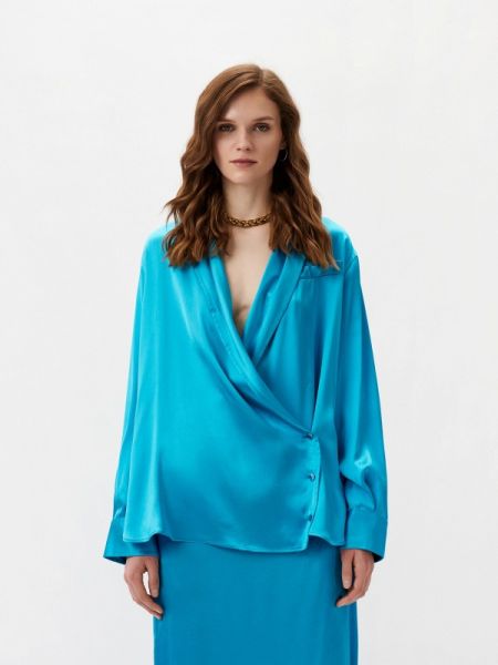 Голубая блузка Nina Ricci
