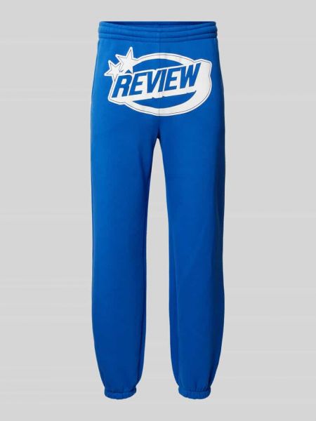 Spodnie sportowe z nadrukiem Review niebieskie