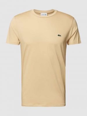 Koszulka bawełniana w jednolitym kolorze Lacoste beżowa
