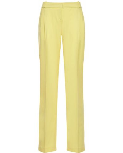 Vlněné kalhoty s nízkým pasem relaxed fit Coperni žluté