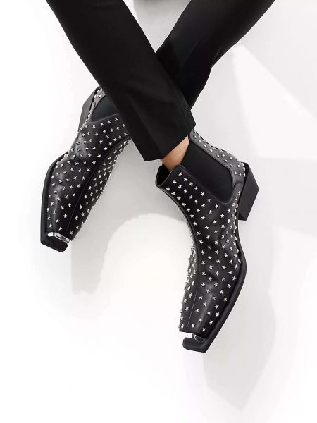 Ботинки челси на каблуке со звездочками Asos черные