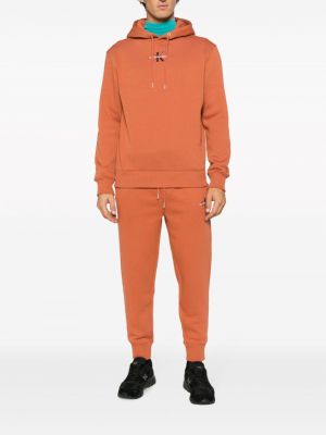 Sportovní kalhoty s výšivkou Calvin Klein Jeans oranžové