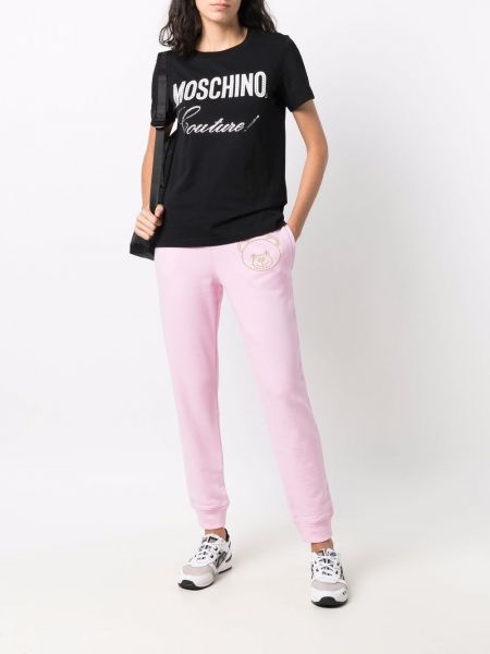 Pantalones de chándal con apliques Moschino rosa