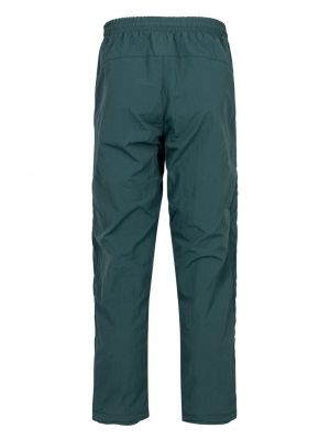 Sportovní kalhoty na zip Unknown Uk zelené