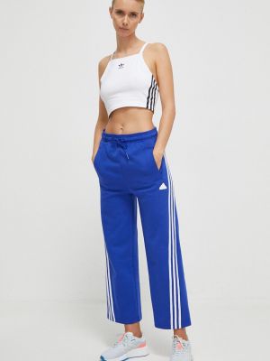 Sportovní kalhoty s aplikacemi Adidas modré