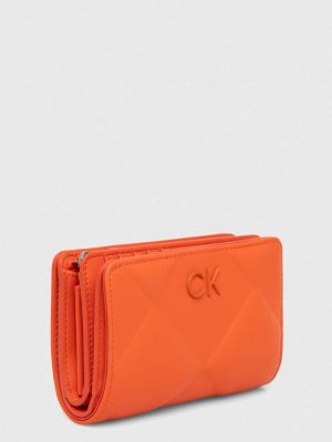 Jeansy Calvin Klein pomarańczowe