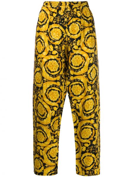Pantalones con estampado Versace amarillo
