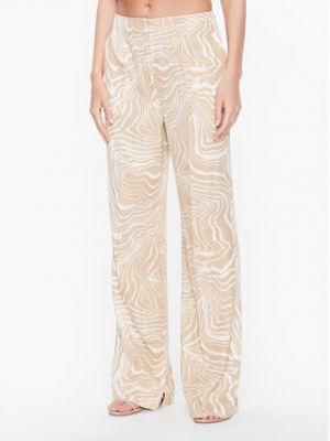 Bavlnené priliehavé široké nohavice s potlačou Calvin Klein béžová