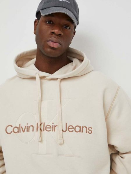 Bavlněná mikina s kapucí s aplikacemi Calvin Klein Jeans béžová
