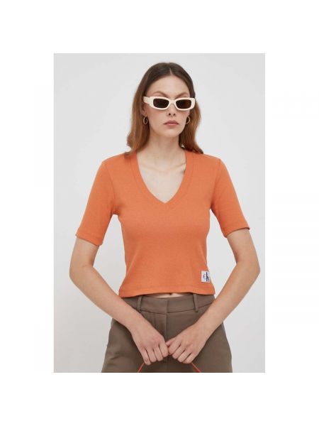 Tričko Calvin Klein Jeans oranžové