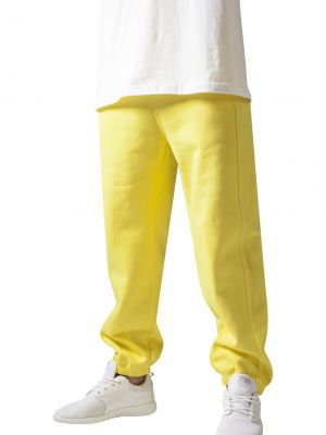 Teplákové nohavice Urban Classics žltá