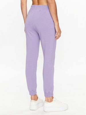Priliehavé teplákové nohavice Pinko fialová