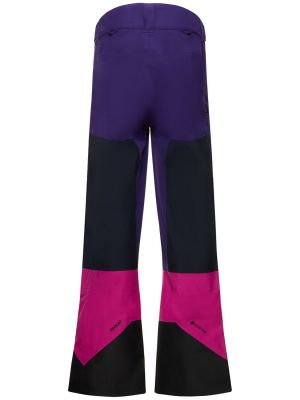 Teplákové nohavice Peak Performance fialová