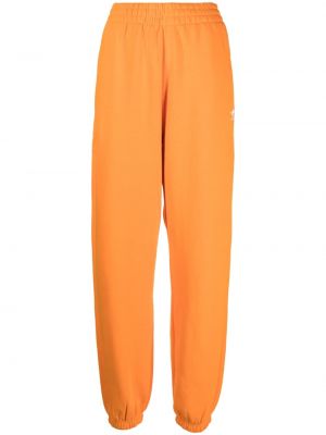 Pantaloni cu broderie din bumbac cu broderie Adidas portocaliu