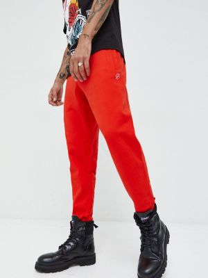 Памучни панталон Superdry червено